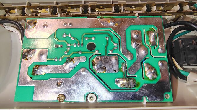 Suppression circuit board underside showing solder joints, heavy copper traces, and power-distribution circuitry.