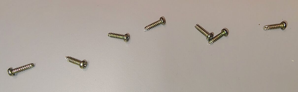 Enclosure screws removed during teardown.