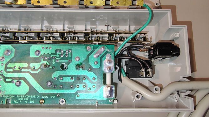 Cord-entry section showing the switch assembly, power-cord wiring, and suppression-board connections.