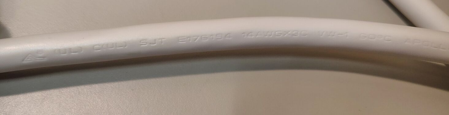 Power cord specifications and manufacturer markings.