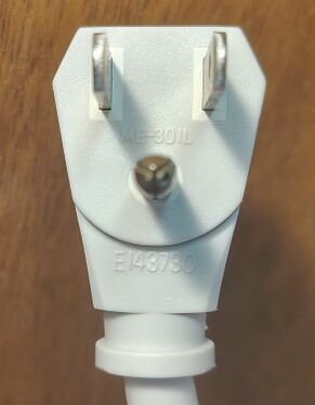 Grounding plug with molded approval markings.