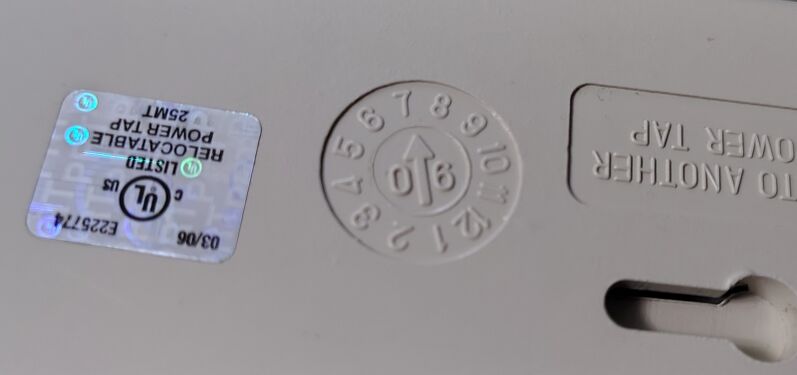 Date wheel indicating July 2006 manufacture.