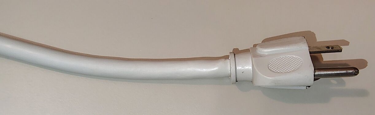 Straight-blade attachment plug and attached power cord.