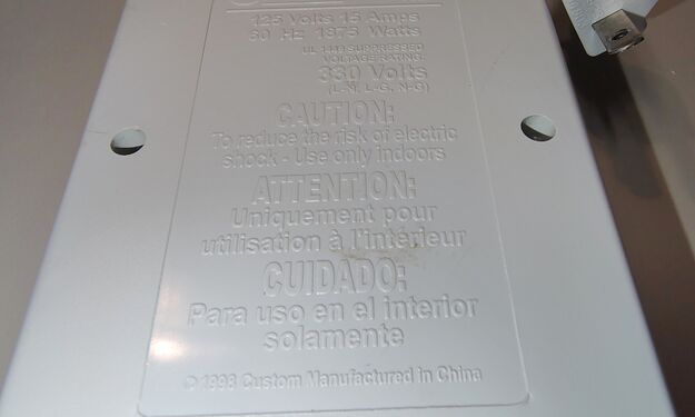 Underside specifications and safety information.