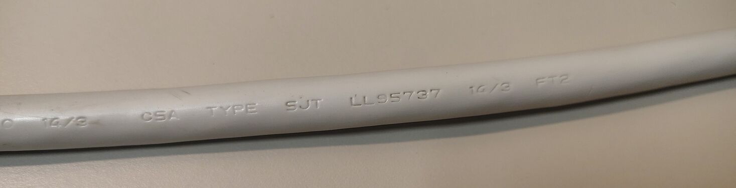 Additional power-cord markings showing CSA approvals and cable construction information.