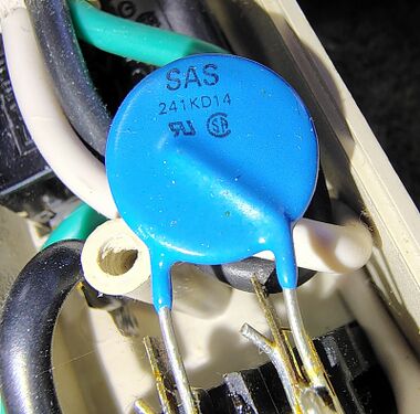 SAS 241KD14 metal-oxide varistor (MOV) providing surge suppression.