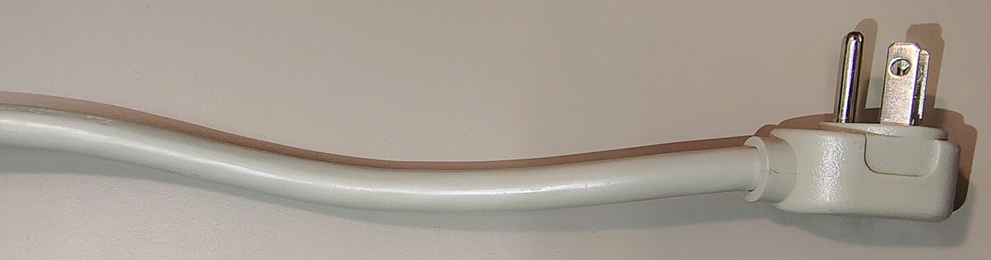 APC-branded right-angle attachment plug and attached six-foot power cord.
