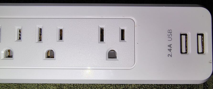 USB charging ports and adjacent outlet section.