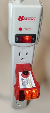 Outlet tester indicating correct wiring and grounding.