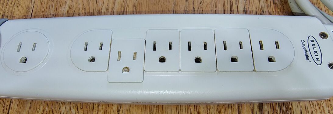 Outlet covers in the open position.