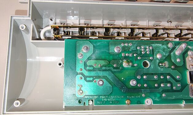 Outlet-end section showing outlet contacts, bus bars, and suppression-board mounting arrangement.