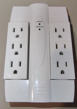 Overall view of the Globe Electric 12-003-7MS surge protector.