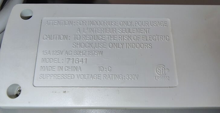 Underside specifications, ratings, and regulatory markings.
