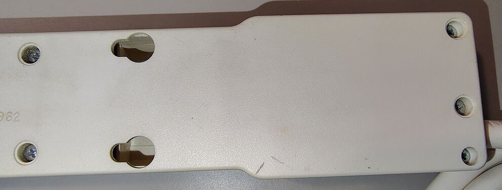 Switch-end underside detail showing mounting provisions and enclosure construction.