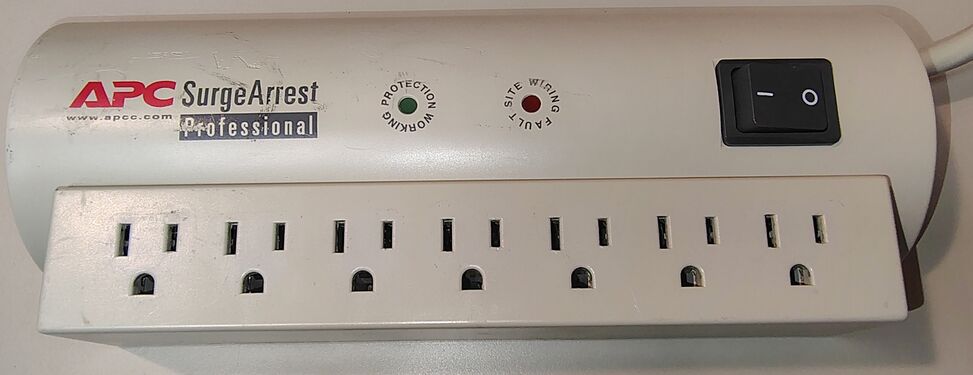 PRO7 connected to power with the rocker switch in the OFF position and indicator lights extinguished.