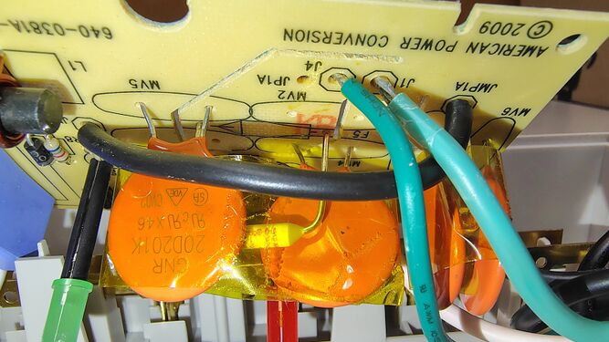 Detailed view of the suppression circuit and PCB markings.