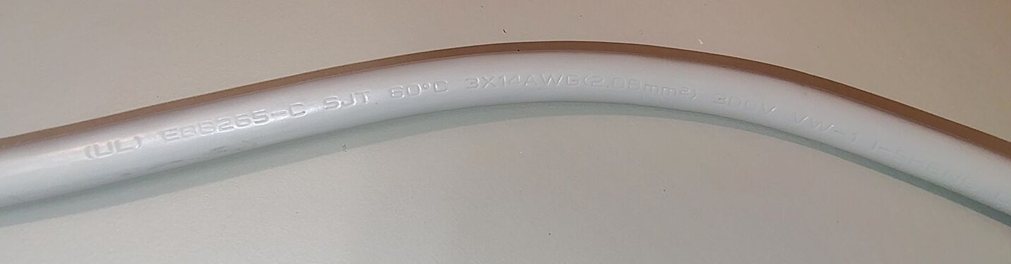Power-cord markings identifying the cord as an I-SHENG-manufactured SJT 14/3 assembly.