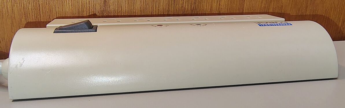 End view showing the distinctive curved upper enclosure of the early PRO7 design.