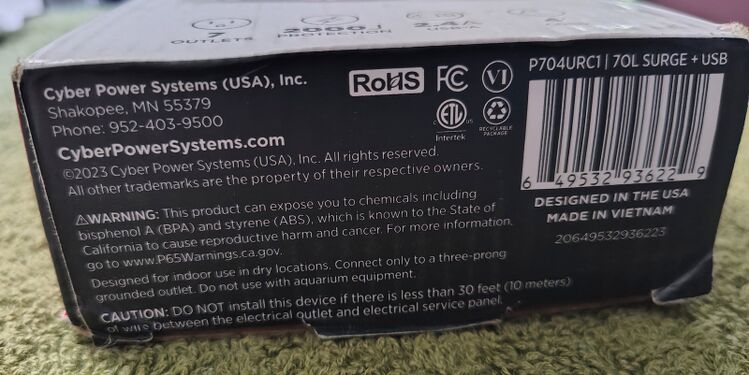 Package end showing regulatory information and UPC barcode.