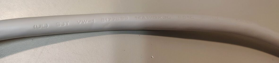 SJT 14/3 cord markings from ACE 33543 relocatable power tap.