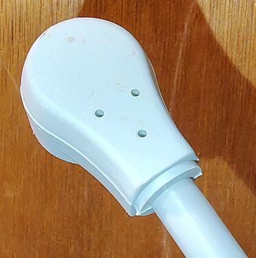 Rear view of the right-angle plug showing the absence of APC branding.