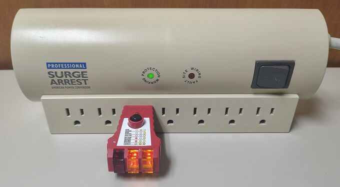 Outlet tester indicating correct wiring and grounding.